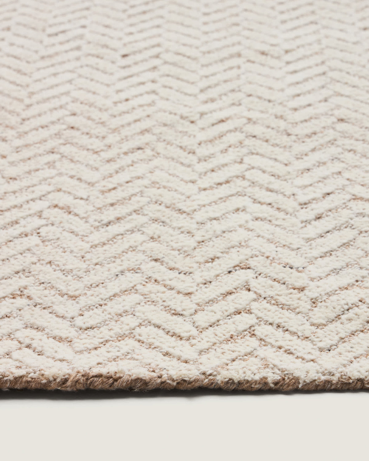 Tapis Japandi en laine jacquard à motif tressé beige 230 x 160 cm - Calira