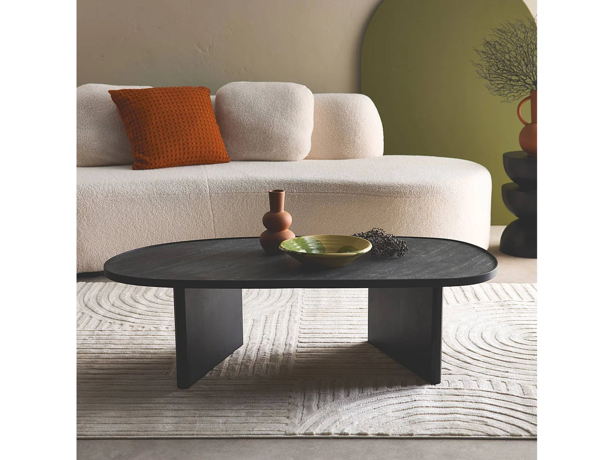 Table basse Japandi ovale en bois de manguier et placage pierre noire 119,5 x 60 cm