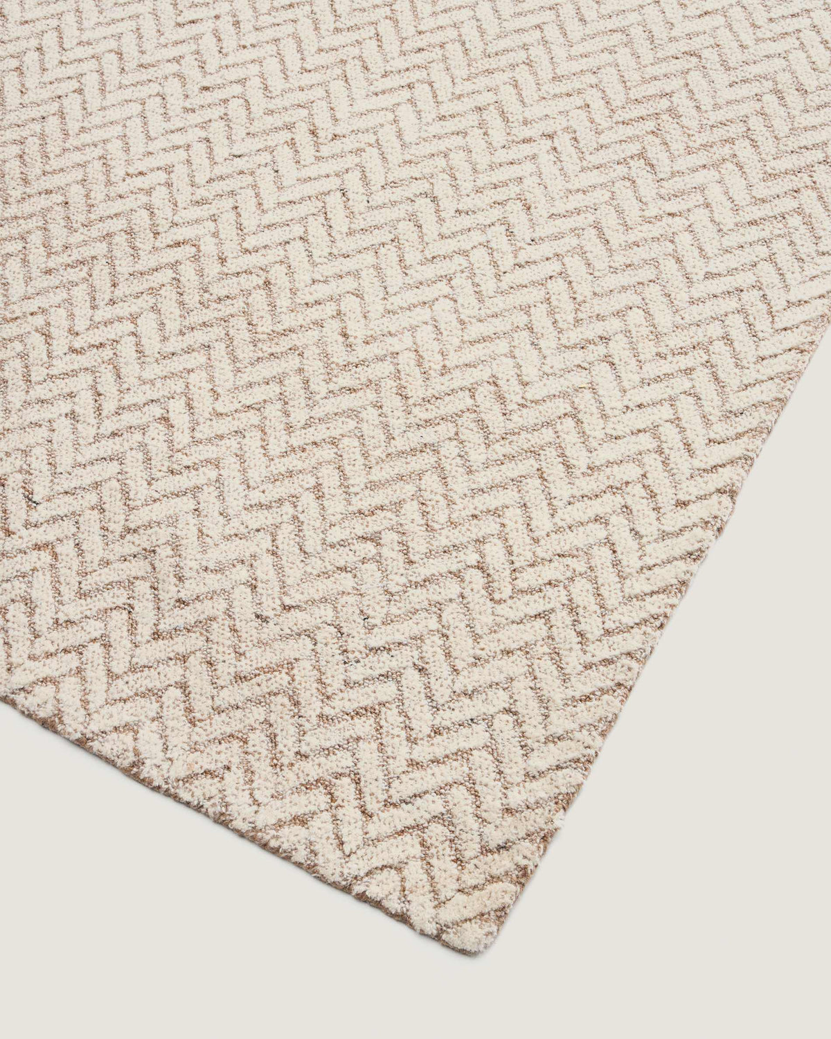 Tapis Japandi en laine jacquard à motif tressé beige 230 x 160 cm - Calira